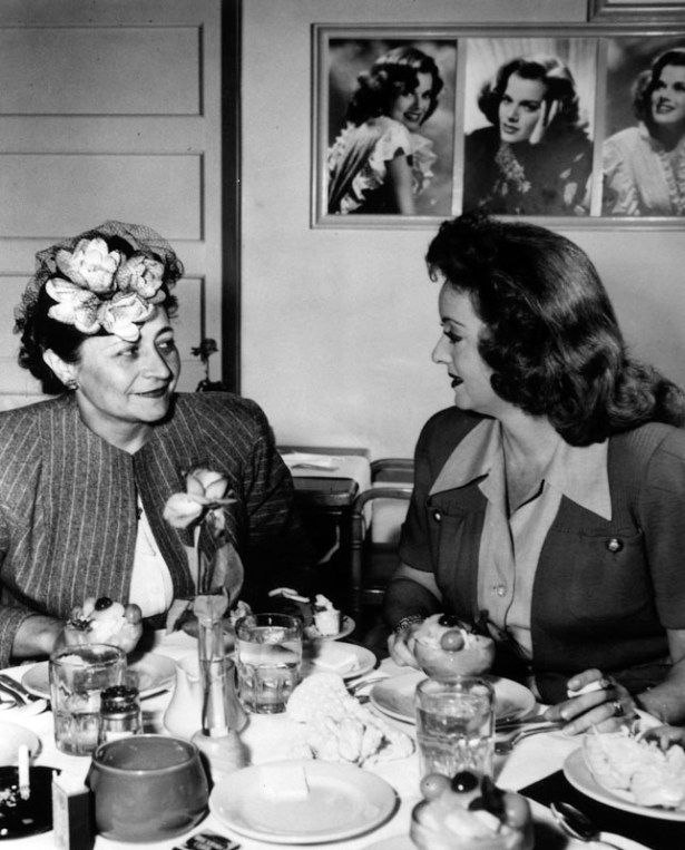 Esther Young with Bette Davis at a luncheon on dedication day. LAPL
